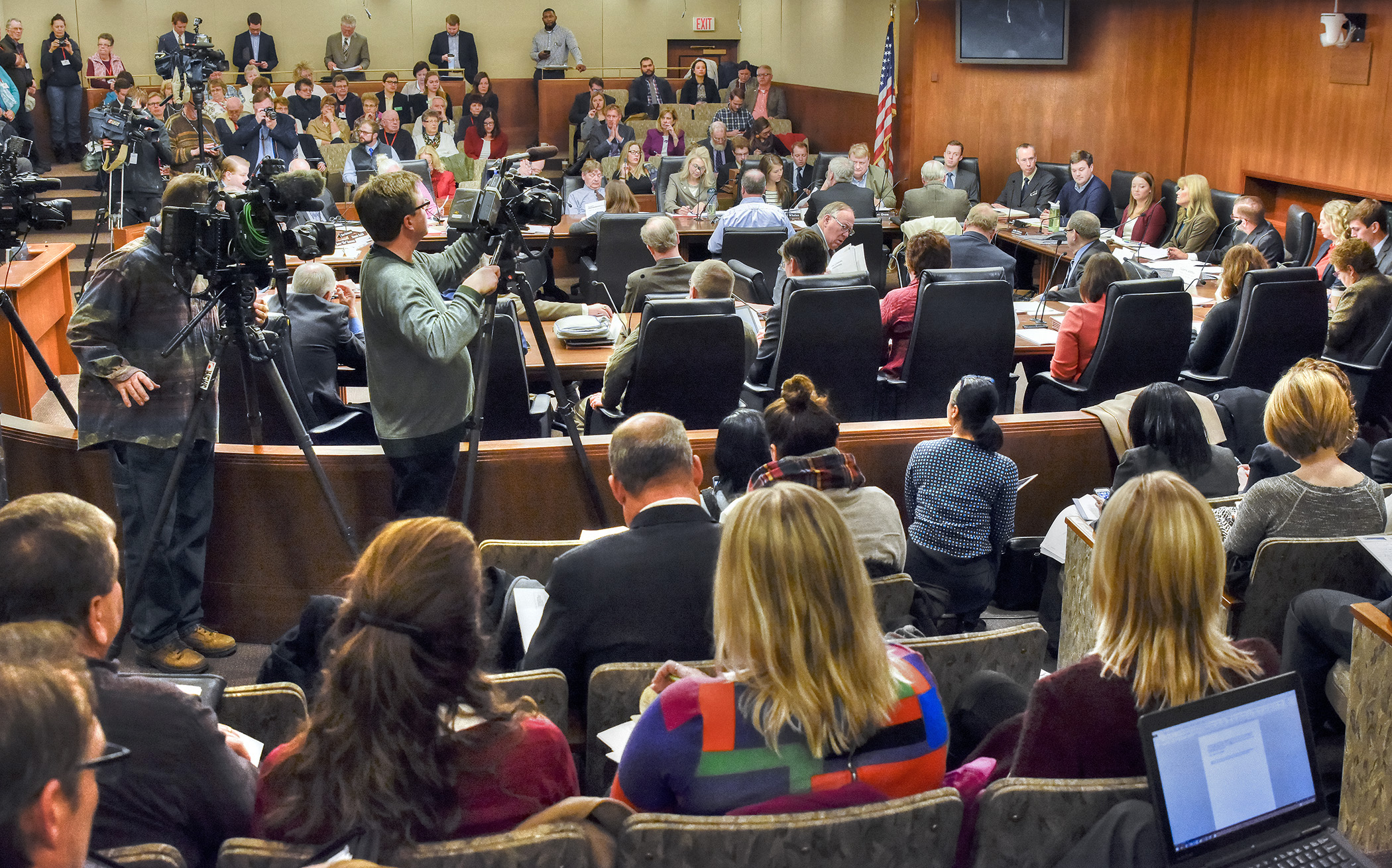 The media and public listen to discussion during a well-attended meeting of the Legislative Working Group on Real ID Compliance Jan 7. Photo by Andrew VonBank
